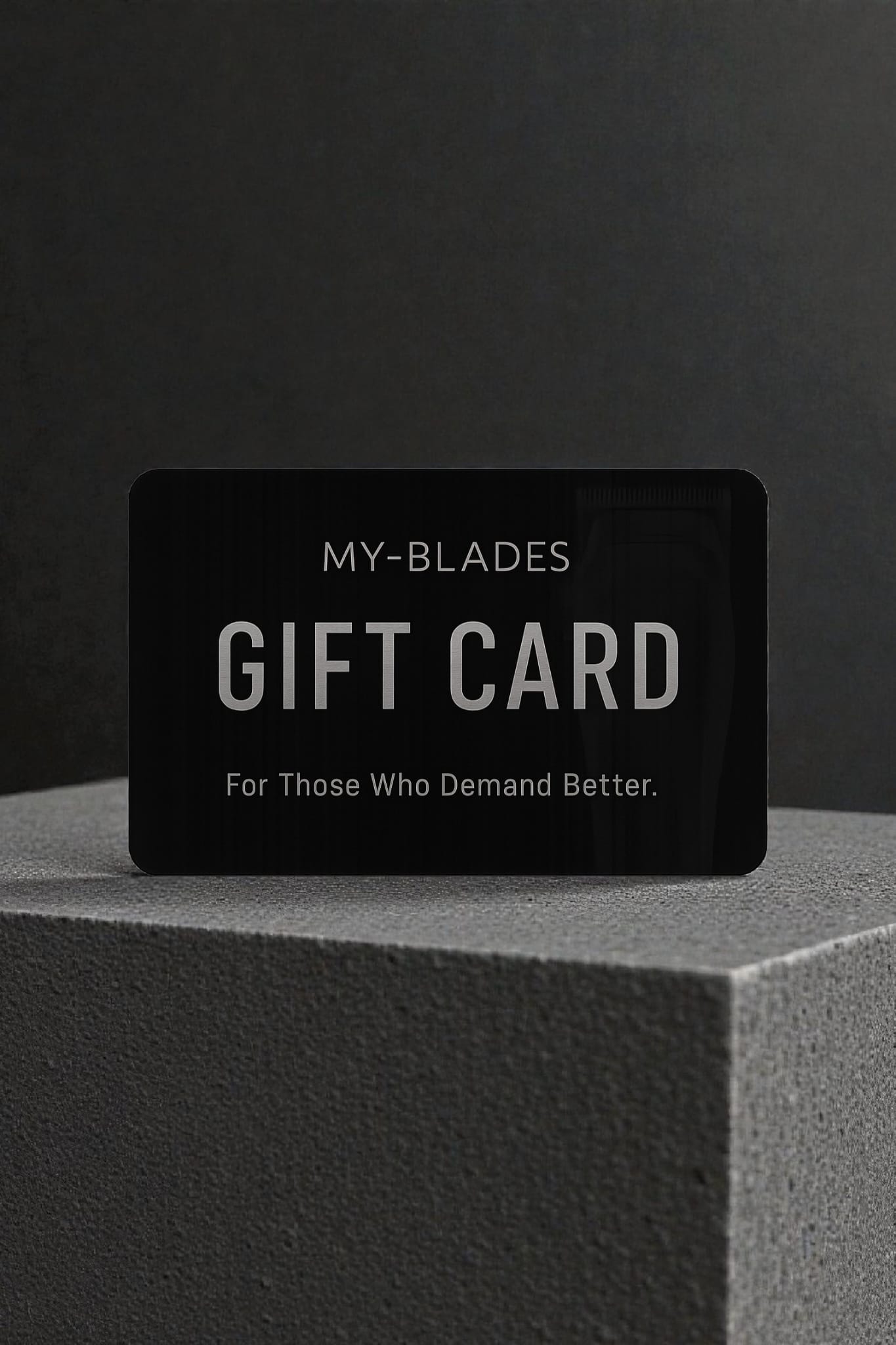 My-Blades digital gift card displayed on textured concrete pedestal with black minimalist design and “For Those Who Demand Better” tagline.