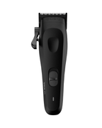 Top view of the Tensor 1 AI-powered professional hair clipper showing its sleek matte-black body, ergonomic controls, and precision blade.