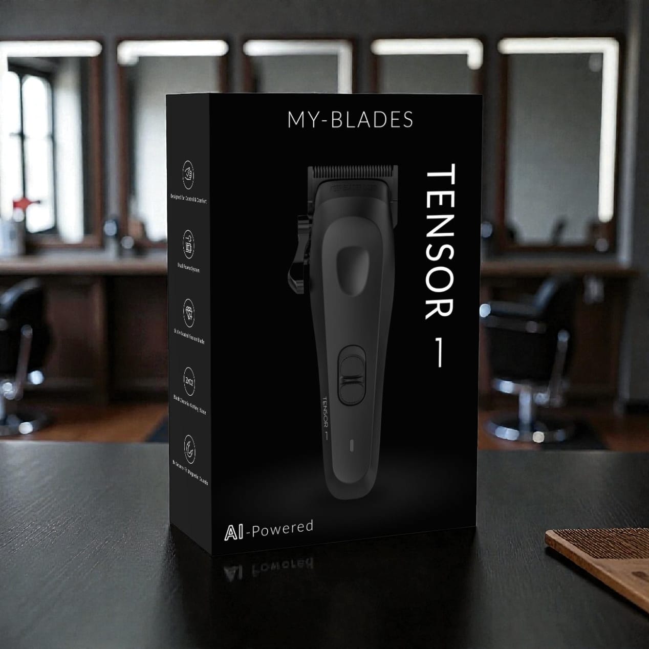 My-Blades Tensor1 retail packaging displayed on a barber workstation with barbershop chairs and mirrors blurred in the background, highlighting the premium black box design and AI-powered branding.